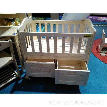 wooden baby crib with drawer